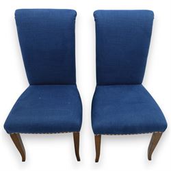 Contemporary set of four blue high back upholstered dining chairs