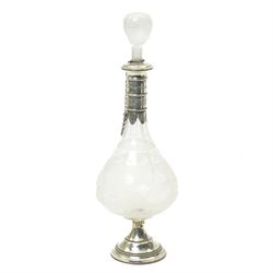 French glass decanter of baluster form with etched decoration and silver collar and foot H33cm