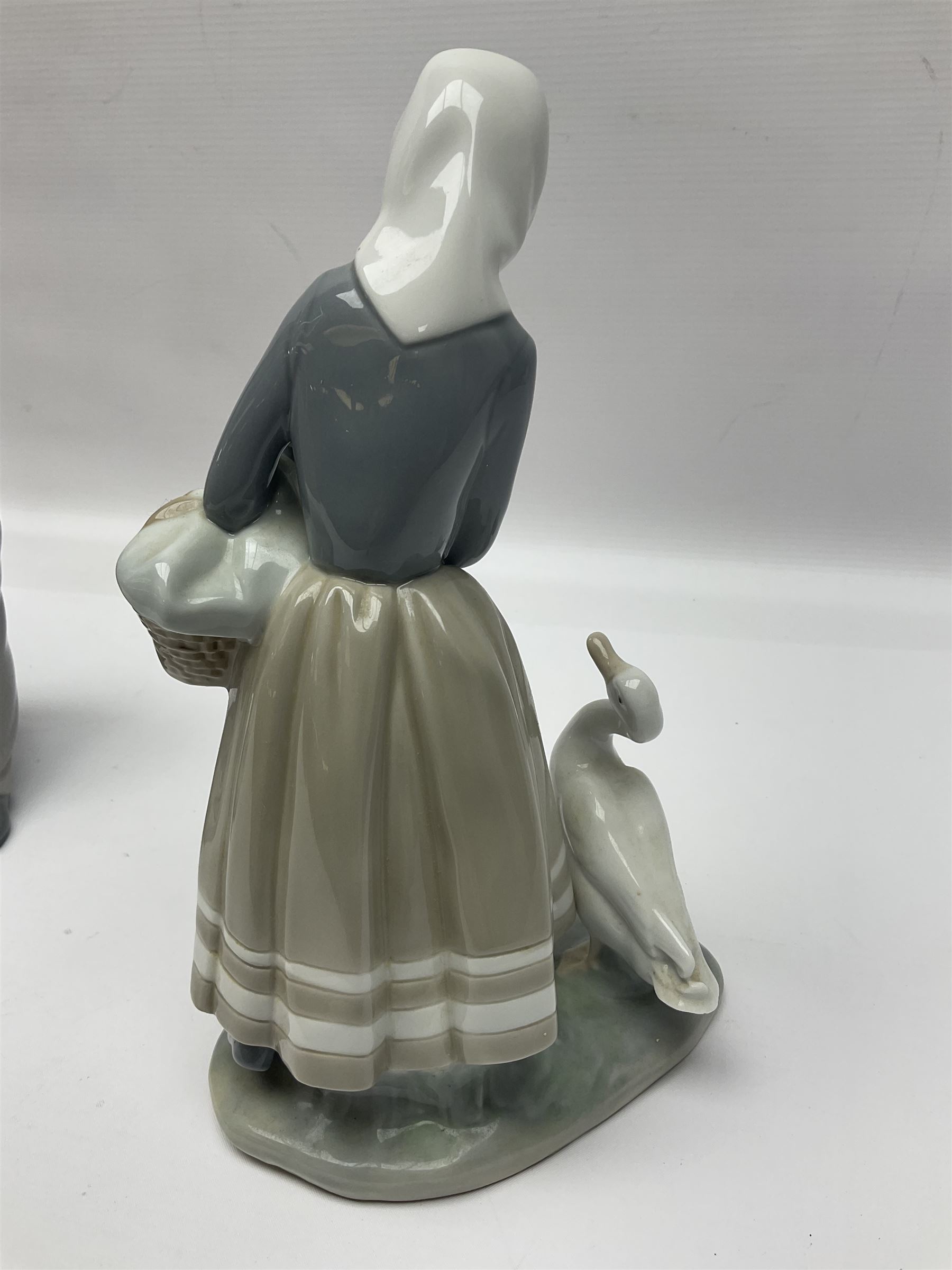 Five Lladro figures, to include How do you do 1439, Sweet Scent 5221, Shepherdess with duck 4568, etc and one Nao 