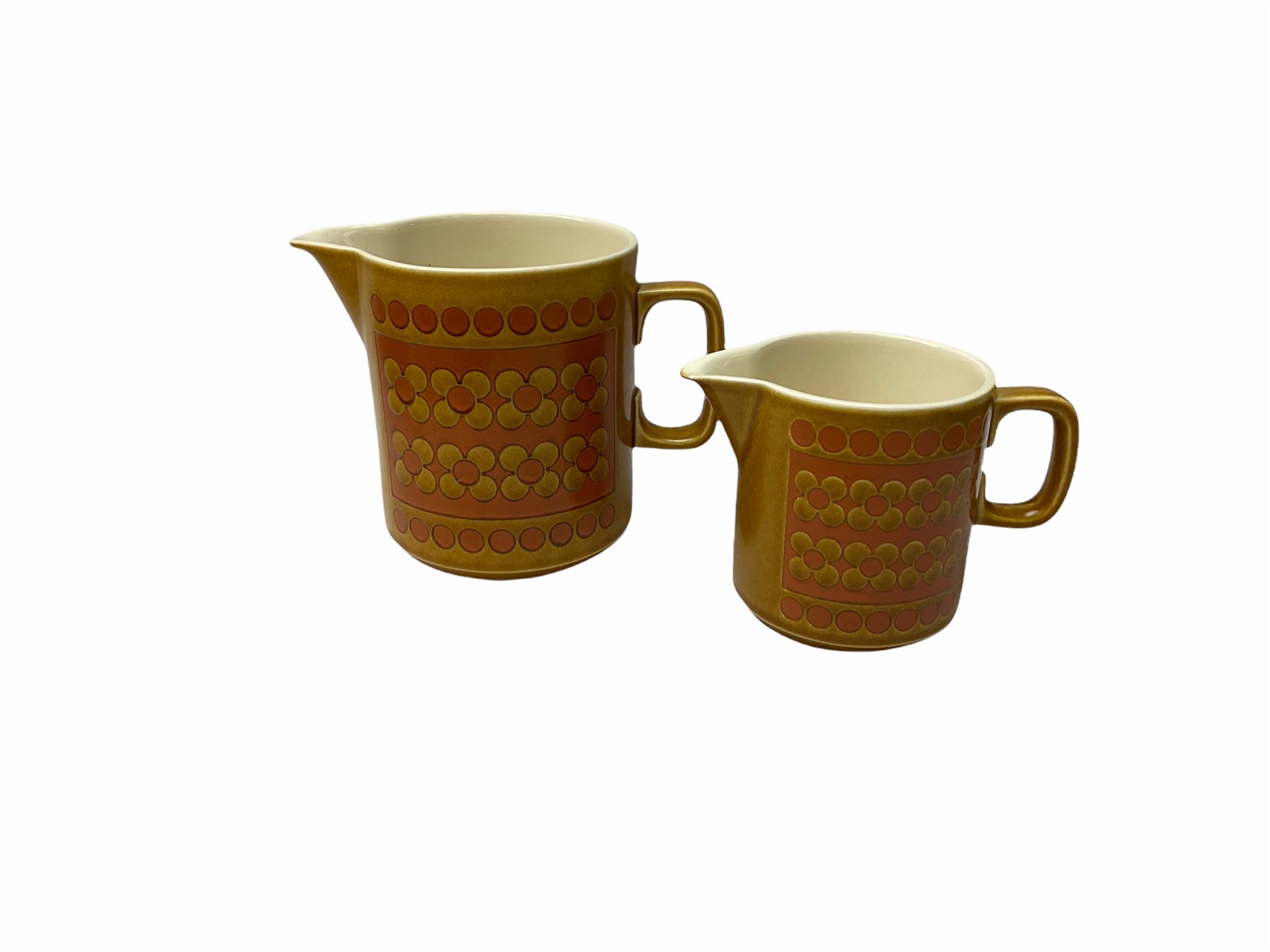 Hornsea Pottery Saffron pattern dinner and tea ware, comprising two lidded vegetable dishes, oval platter, nine dinner plates, six side plates, seven tea plates, covered tea caddy, covered coffee caddy, coffee pot, large jug, small jug, eight cups and seven saucers (45).  