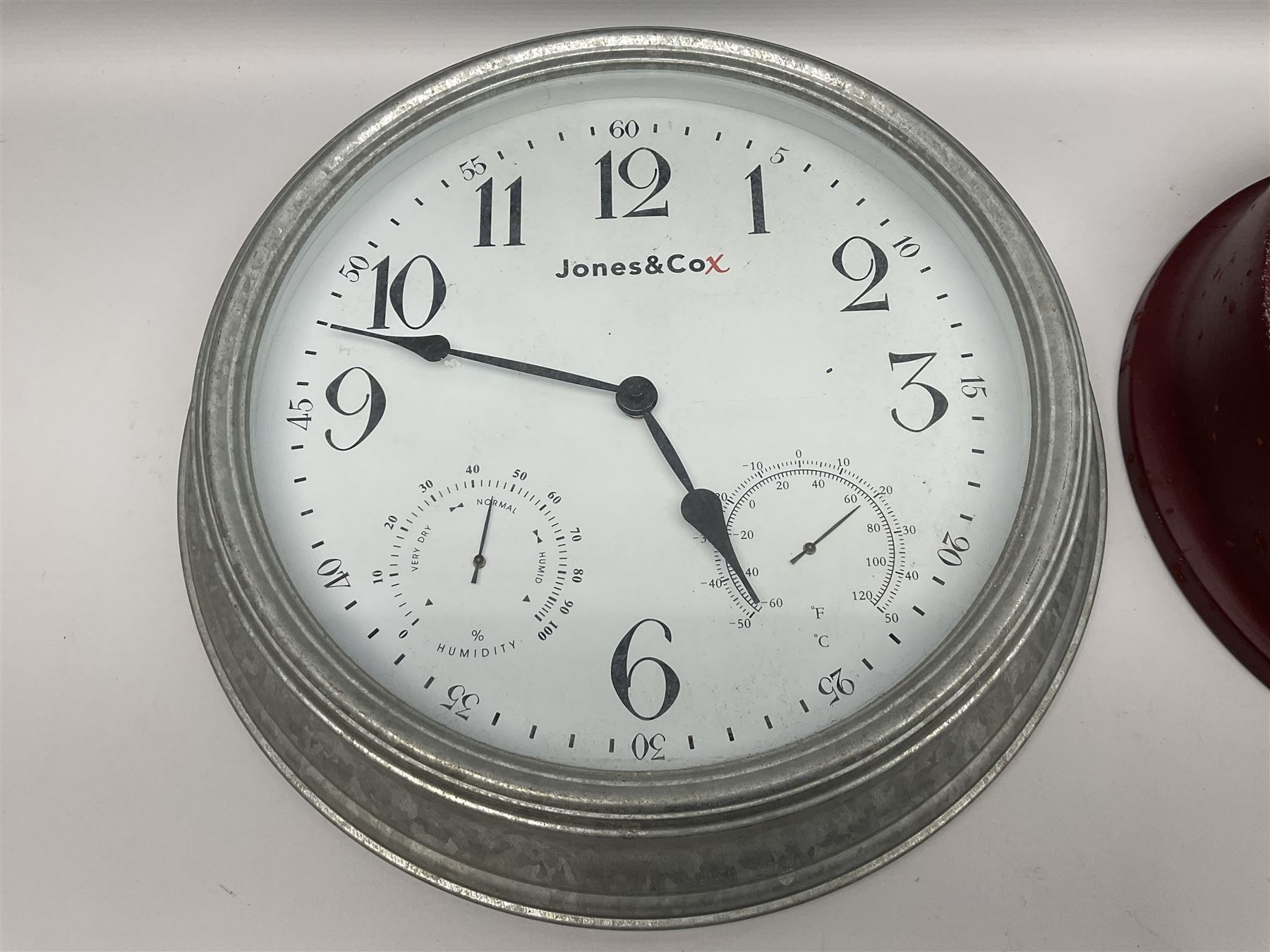 Esso Advertising Wall Clock, 'Put A Tiger In Your Tank', together with Jones & Co wall clock, largest example D40cm