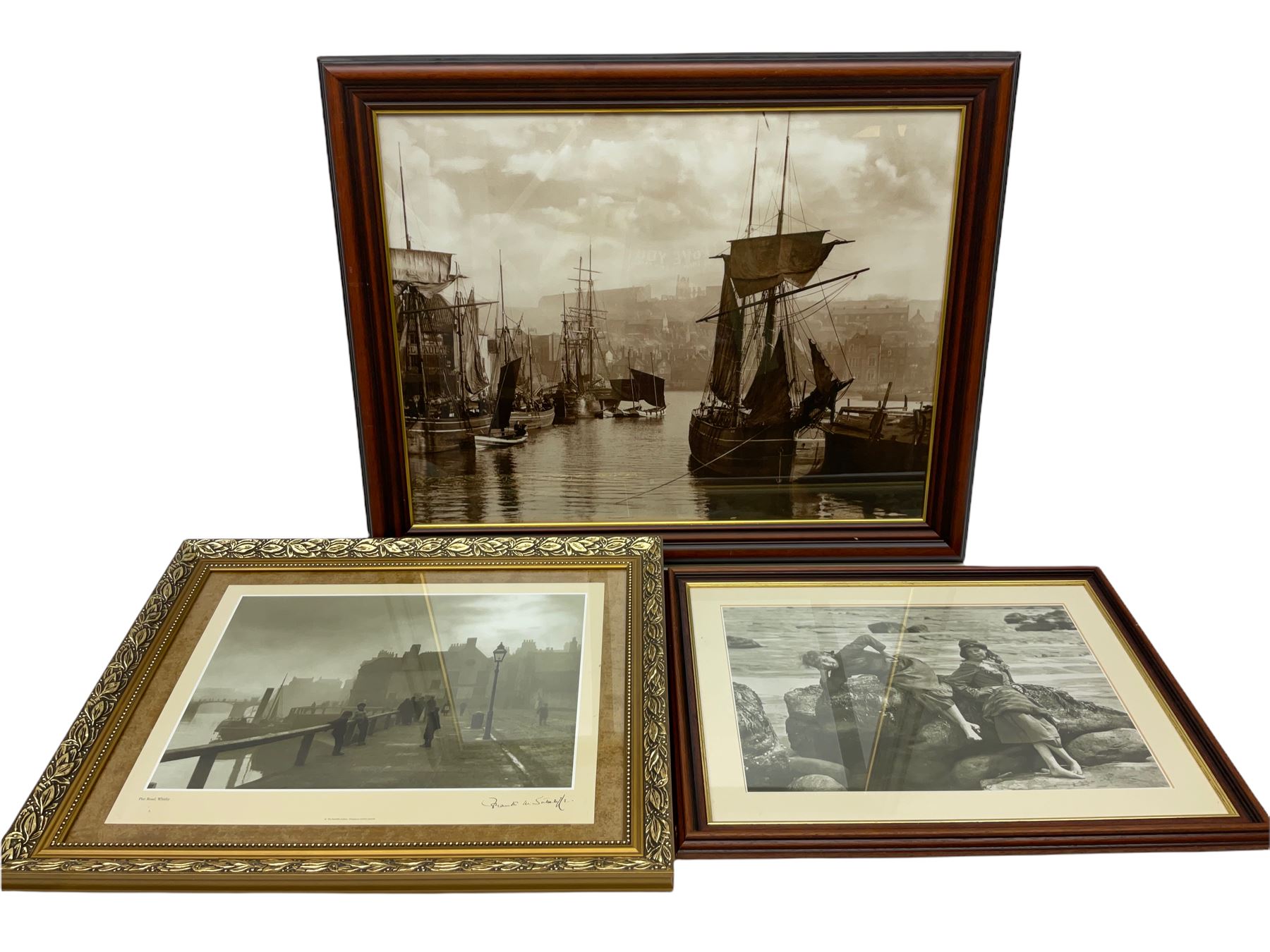 After Frank Meadow Sutcliffe (British 1853-1941): 'Pier Road Whitby' 'Limpets' & 'Dock End Whitby', three b & w prints 48cm x 64cm diminishing (3)
