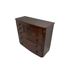 Early 19th century mahogany bow front chest, fitted with eight drawers, the corners fitted with reeded quarter columns