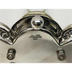Sheffield silver-plated cruet set, comprising mustard pot, open glass salt and pepper pot on stand, together with a collection of silver plated spoons