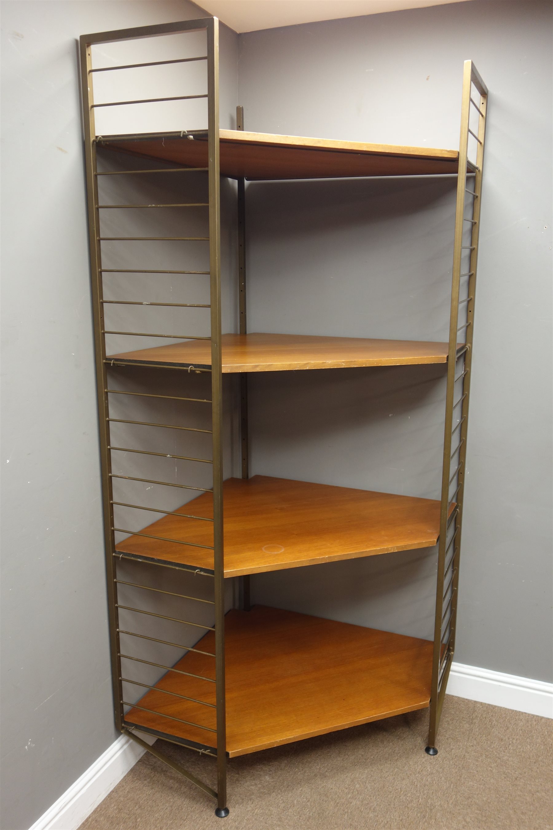 1960s 'Ladderax' corner bookcase system, four teak shelves with black