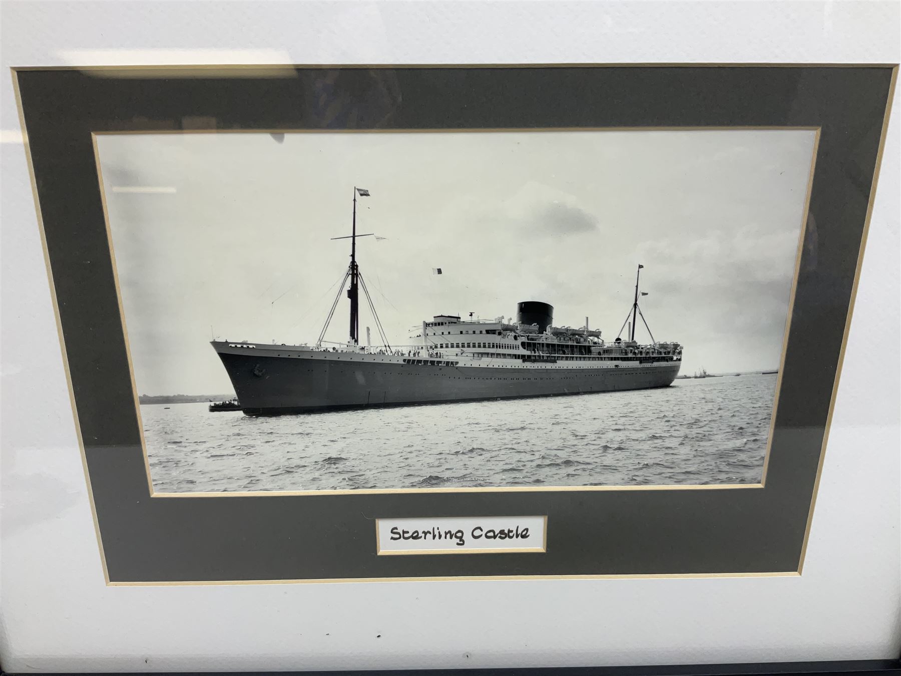Set of twelve monochrome photographs of mid-20th century merchant vessels comprising general cargo ships, cargo liners, RMMV passenger cargo liners and hospital ship including Rowallan Castle, Drakensberg Castle, Stirling Castle, Capetown Castle, Pachumba, Tilapa etc; average size 18 x 24cm; uniformly mounted in black frames (12)