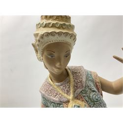 Lladro figure, Thai Dancer, modelled as a dancer kneeling, sculpted by Vincente Martinez, no 2069, year issued 1977, year retired 1999, H45cm