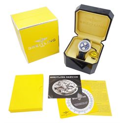 Breitling Old Navitimer gentleman's stainless steel automatic wristwatch, Ref. A13322 serial No. 517301, blue dial with date aperture,  silvered subsidiary dials at 6, 9 and 12 for seconds, 30 minute and 12 hour recording, bi-directional inner slide rule scale, on blue leather strap, boxed with papers and receipt dated 2002