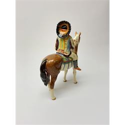 A Beswick Native American on horseback, with printed mark beneath, H21.5cm. 