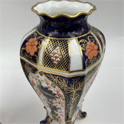 Pair of early 20th century Royal Crown Derby Imari 1128 pattern vases, of tapering straight sided form with waisted neck and frilled rim, upon four splayed feet, with printed and painted marks beneath including illustration date codes for 1911 and 1920, H17cm