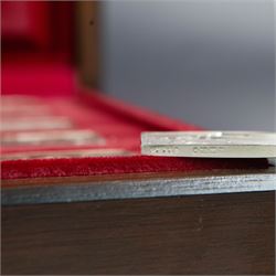Elizabeth Our Queen silver ingots collection, twenty-five rectangular ingots each decorated in relief with a Royal scene, hallmarked John Pinches Ltd, London 1976, in wooden presentation case with information booklet