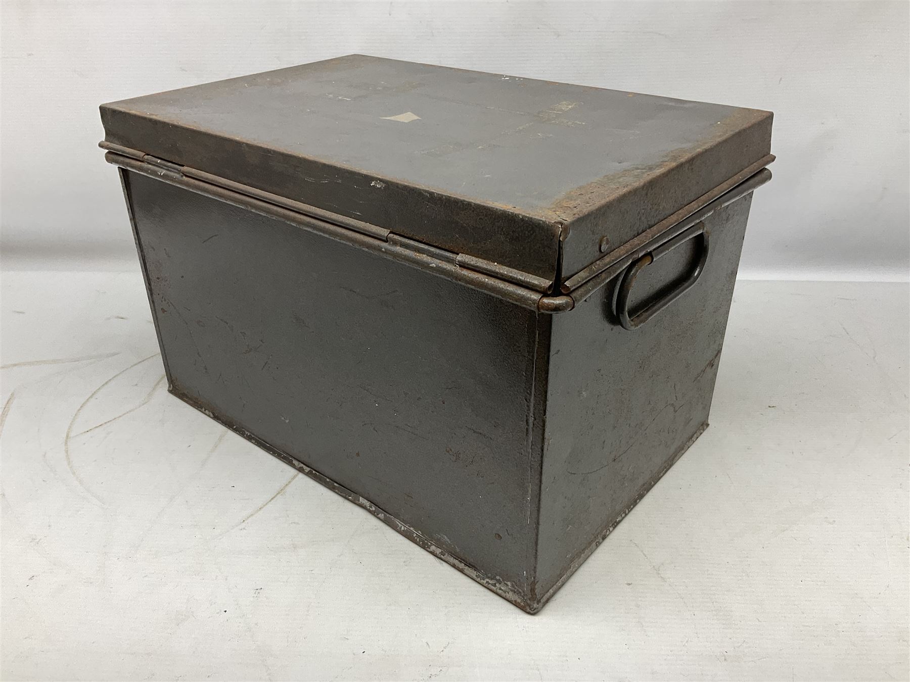 Assorted militaria including ten leather or canvas cartridge and other belts, maroon beret with 17th Lancers cap badge, modern bullet mould, leather and brass shot flask, two knives, shell cases, boomerang etc; in tin deed box