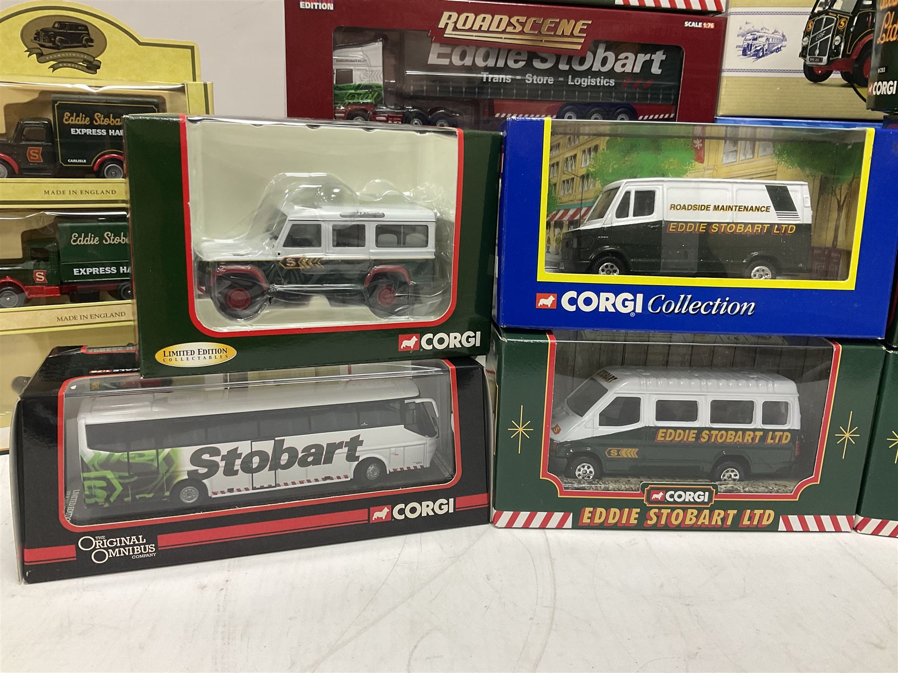 Corgi Eddie Stobart - eighteen promotional and advertising models including heavy haulage vehicles, coach, figures etc; and five others by Saico, Lledo and Atlas Editions; all boxed (23)