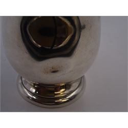 1930s silver Christening mug, of plain waisted form, with acanthus capped scroll handle, upon stepped circular foot, hallmarked Barker Brothers Silver Ltd, Birmingham 1933, including handle H10cm 