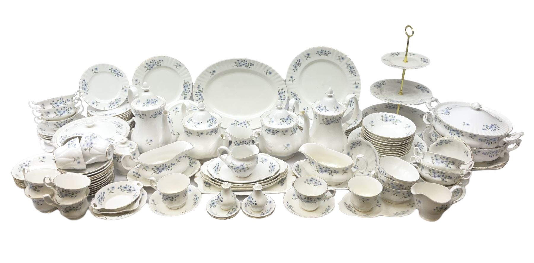 Extensive Richmond Blue Rock pattern part tea and dinner service, to include seven dinner plates, nine smaller plates, three lidded twin handled tureens, two teapots and two coffee pots, eleven bowls, cake stand, six twin handled soup bowls and saucers, six teacups, four coffee cups, milk jugs, sucrier, cake plate, salt and pepper shakers, other plates, dishes, bowls, side plates and many spares etc