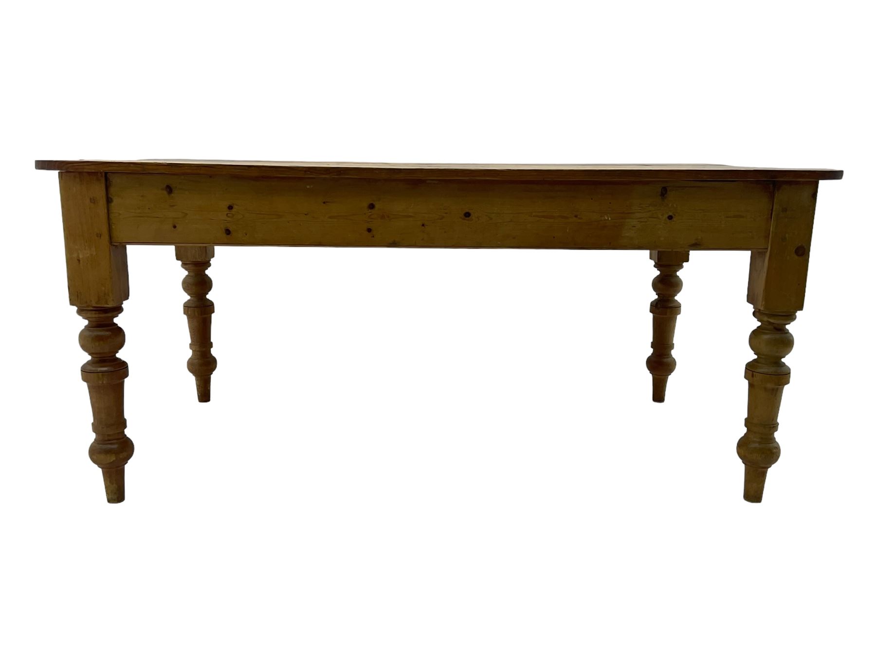 Victorian pine farmhouse dining table, rectangular plank top with rounded corners, on turned supports 