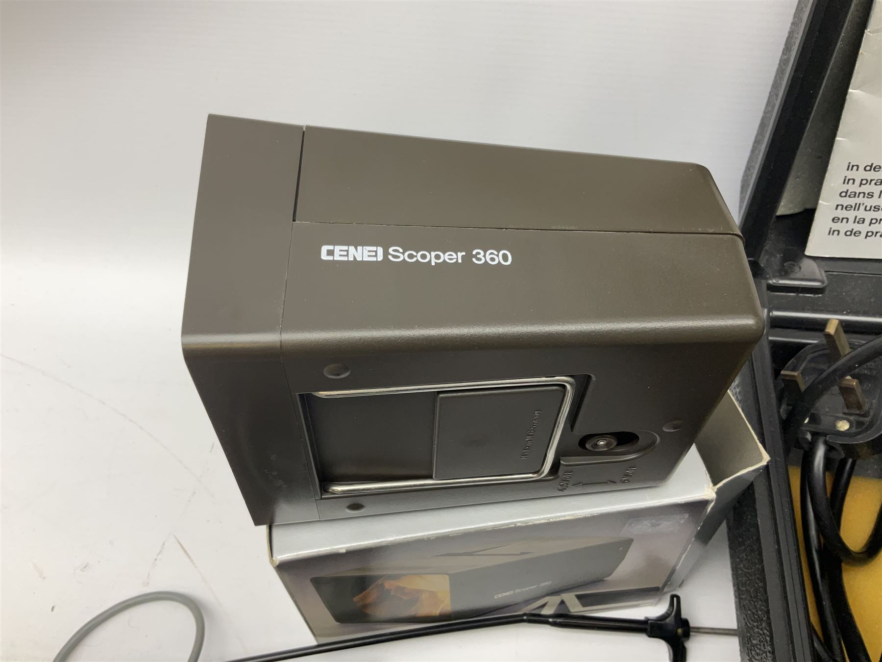 Cased Rollei projector together with a palar projector screen, autofocus slide projector and cenei scoper 360 