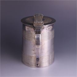 George III silver lidded tankard, with two ribbed bands to the cylindrical body, the hinged lid with concentric circle to cover and pierced thumbpiece, hallmarked Charles Fox I, London 1816, including thumb piece H16cm