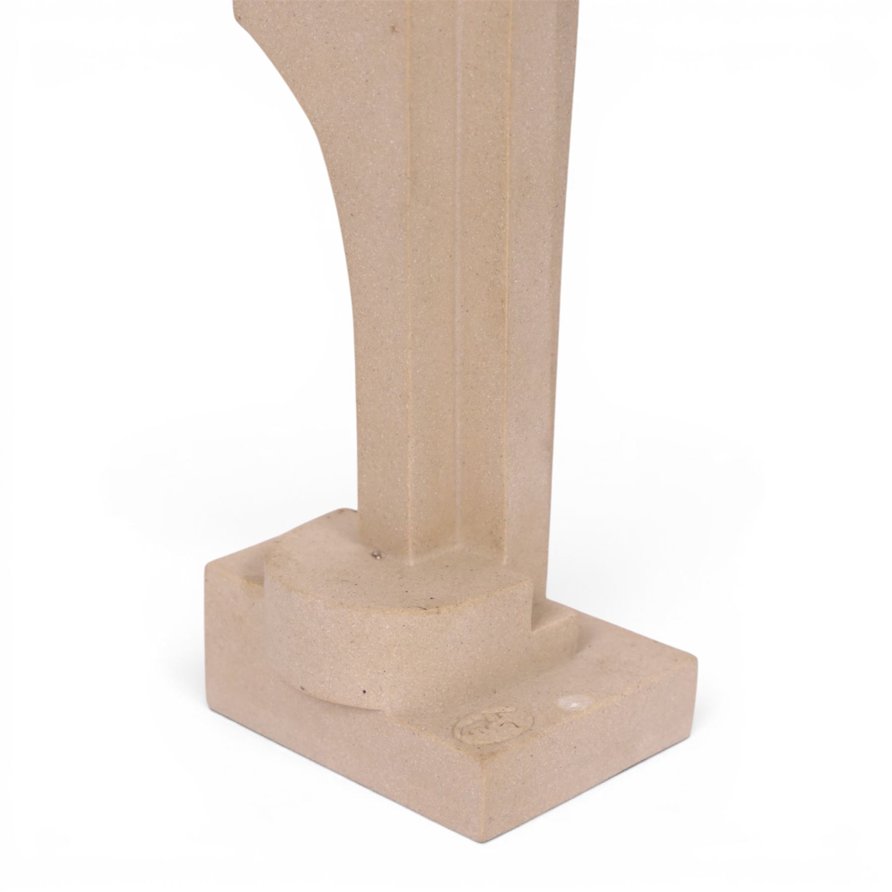 Abrstact stone sculpture, of geometric shapes with a central circular gap, raised upon a stepped rectangular base, H36cm