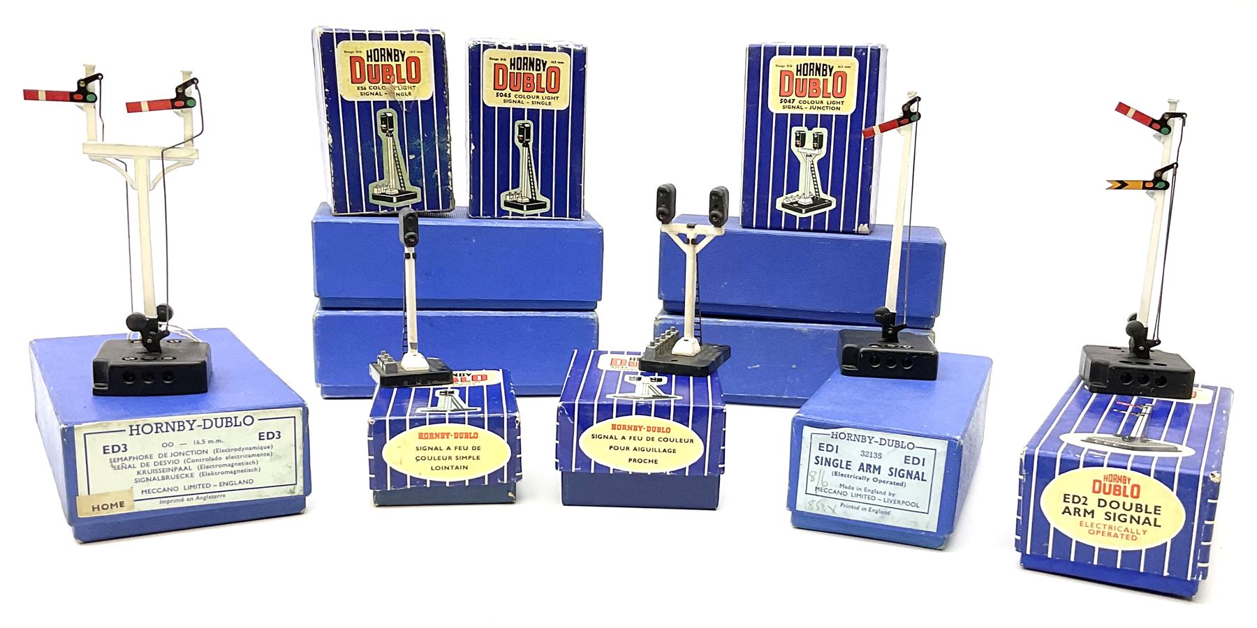 Hornby Dublo - twelve electric semaphore signals comprising four ED1 Single Arm; two ED2 Double Arm; one ED3 Junction Signal Upper Quadrant; one 5045 Colour Light Signal - Single (Home); two ES6 Colour Light Signal -Single (Distant); and two 5047 Colour Light Signal - Junction (Home); all boxed (12)