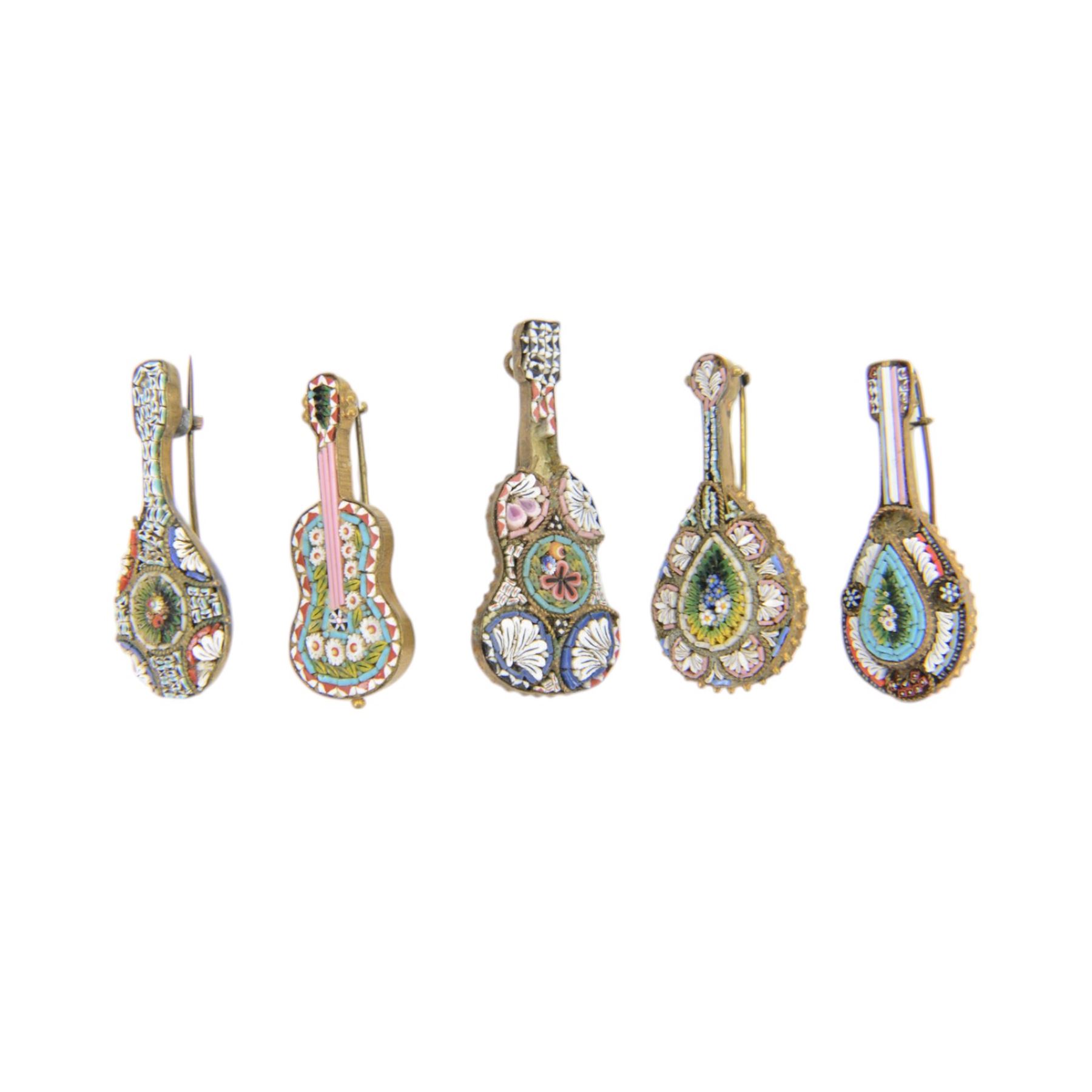 Twenty eight micro mosaic brooches including a Pompei examples, in various shapes including musical instruments 