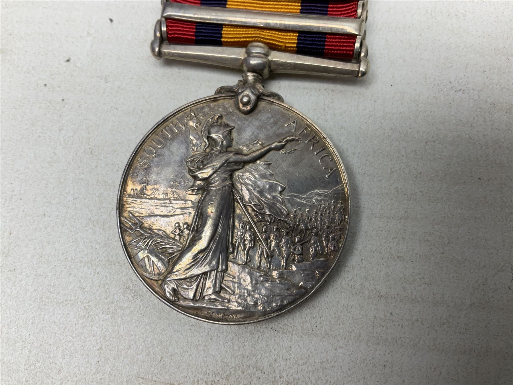 Queens South Africa Medal with five clasps for South Africa 1902/1901, Transvaal, Orange Free State and Cape Colony awarded to 4640 Pte. A. Farmer 1st Dgn. Gds. with ribbon and manuscript biographical details