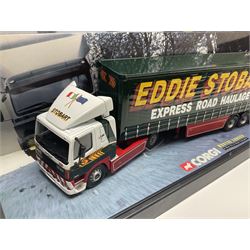 Corgi Eddie Stobart - four heavy haulage vehicles comprising 75201 ERF Curtainside; 75403 Leyland-DAF Curtainside; both in plastic display boxes; CC12610 Scammell Crusader 3 Axle Low Loader; and CC12502 Atkinson Borderer Flatbed Trailer; together with AA30008 Douglas DC-3 Aircraft; all boxed (5)