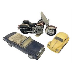 Franklin Mint - three die-cast models comprising 1:10 scale Harley Davidson Heritage Softail motorcycle, 1:24 scale 1957 VW Beetle and 1:24 scale 1993 Rolls Royce Corniche IV; all unboxed (3)