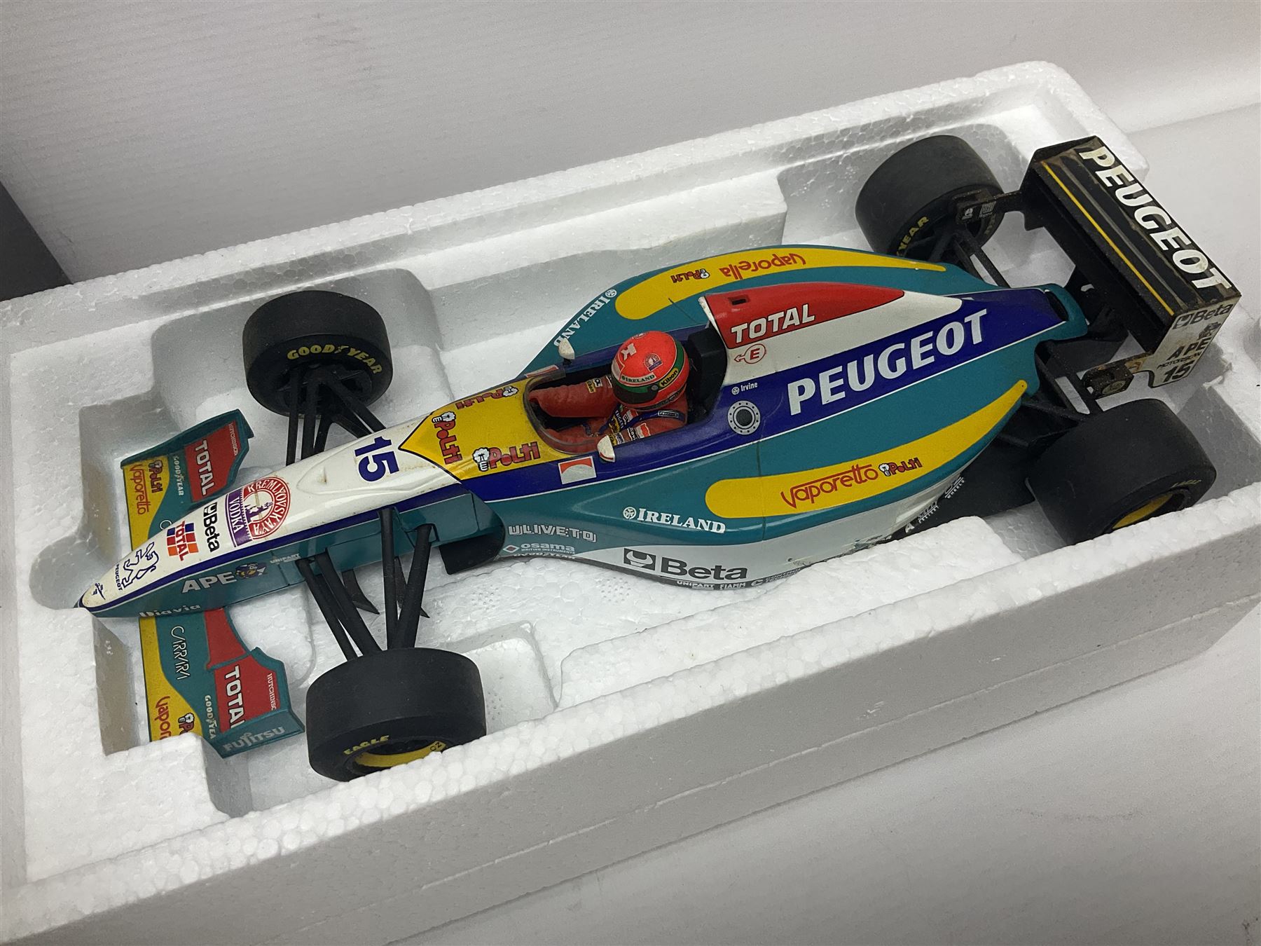 Four Minichamps 1:18 scale die-cast racing cars - Williams F1 Team BMW FW26 R. Schumacher; McLaren Mercedes MP4-12 D. Coulthard; McLaren Mercedes MP4-13 M. Hakkinen; and Formel 1 Jordan peugeot EJR 195 E. Irvine; all boxed (4)
