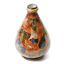 Doulton Lambeth Faience vase, painted profusely with flowers in typical colourway, attributed to Christina Wood, impressed marks and indistinct monogram to base, H25.5cm 