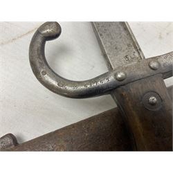 French Model 1874 Epee bayonet marked Oulle 1876 in associated scabbard; Model 1866 sabre bayonet in cut-down sword scabbard; and Model 1842/59 sabre bayonet in relic condition (3)