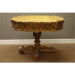  19th century Italian Rococo gilt centre table, canted octagonal top covered in gold damask fabric, frieze with carved scrolling mounts, cruciform base with acanthus leaf decoration, 105cm x 105cm, H77cm  