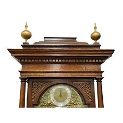 Henry Hindley of York – mid-18th century oak cased 8-day longcase clock,
flat topped caddy pediment with gesso finials, rectangular hood door flanked by wooden turned pilasters with capitals, canted trunk with a full-length break arch topped door on a short plinth with applied skirting and bracket feet, brass dial with a silvered chapter ring, Roman numerals and five-minute Arabic’s, minute and inner quarter hour tracks, matted dial centre with subsidiary seconds dial, blued steel hands and female head pattern spandrels, silvered calendar dial to the break arch with dolphin spandrels, four pillar rack striking movement, striking the hours on a bell. With weights and pendulum. 
H250 W48 D27
Henry Hindley originally from Wigan (Lancs) is recorded as working in York from Petergate 1731-41 then Stonegate 1741-1771. A famous and highly innovative maker, often referred to as the “Tompion of the North.” 

