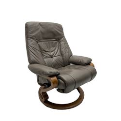 Himolla - reclining swivel armchair, upholstered in grey leather, with foldout foot rest 