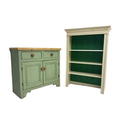 Painted pine cupboard, fitted with single drawer over double cupboard (W95cm, H88cm, D43cm); together with pine bookcase in off-white finish (W91cm, H128cm, D31cm)