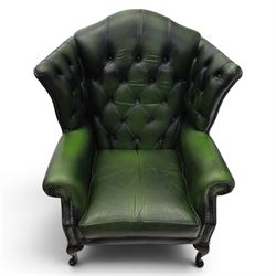 Thomas Lloyd - Pair of Queen Anne design wingback armchairs upholstered in buttoned green leather, button back and scrolled arms, raised on cabriole supports. 