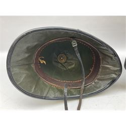 Hull City Police - helmet with king's crown night plate; two further ball-top helmets with Queen's crown plates; and a peaked cap (4)