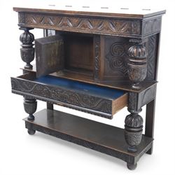 Jacobean revival oak side cabinet, rectangular top above carved frieze of stylised foliage and lunettes, fitted with a central cupboard doors with applied carved panels, above a frieze drawer, supported on turned and carved vase-shaped supports, united by stretcher tier and lower shelf