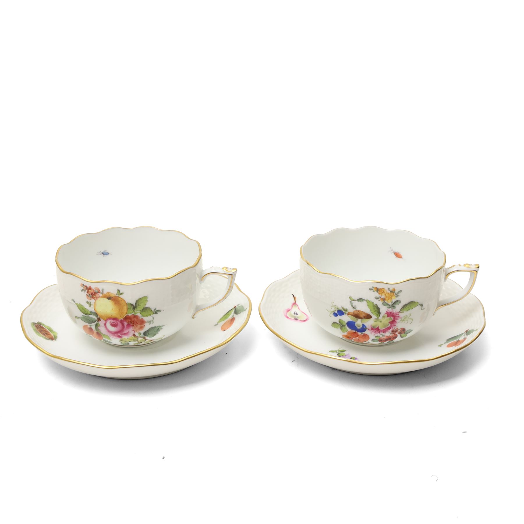 Herend porcelain Tete a Tete decorated with sprays of Spring flowers and scattered leaves etc comprising cabaret tray, two cups and saucers, tea pot, leaf shape bowl and milk jug, some pieces marked Pek Jozsefine