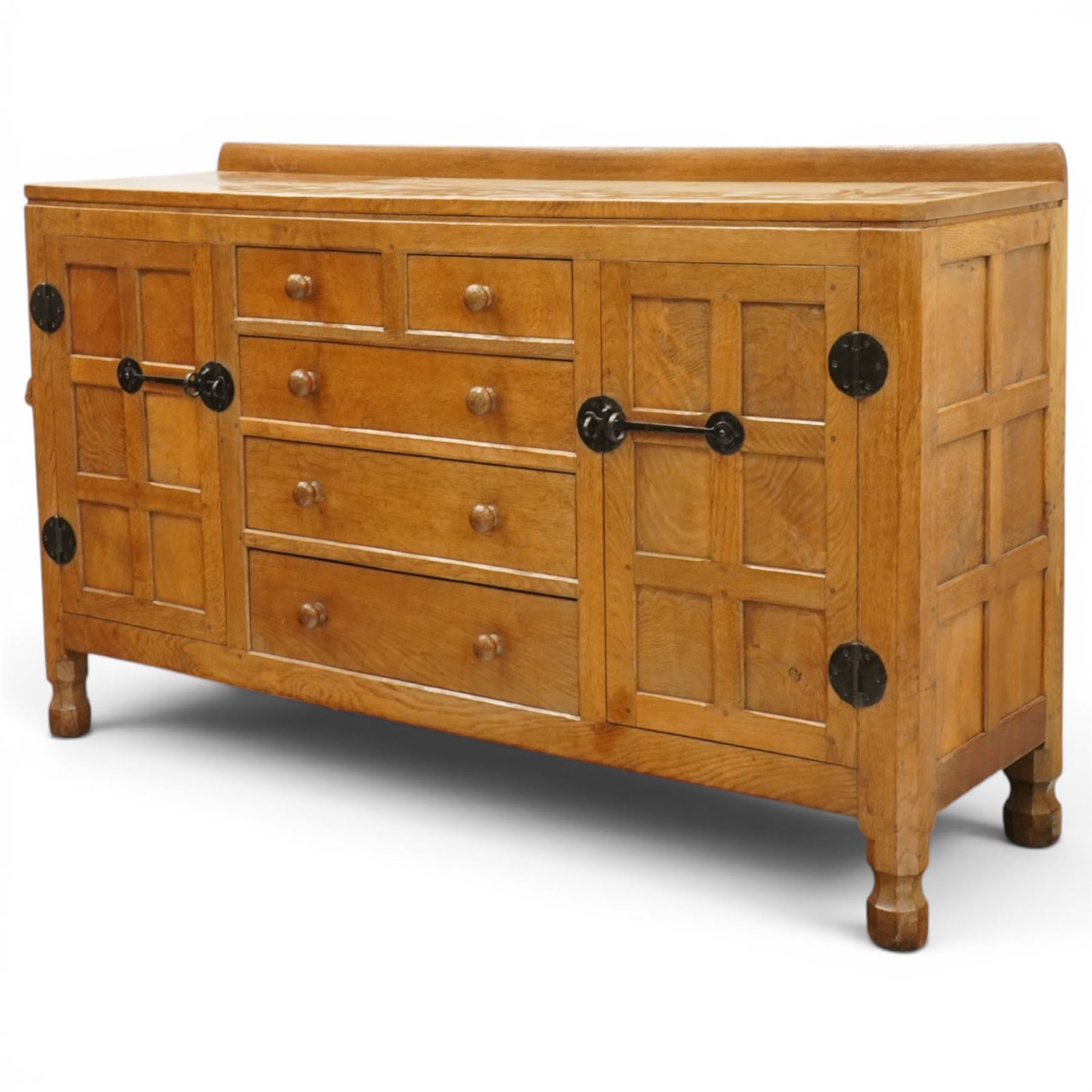 Mouseman - adzed oak dresser, rectangular top with galleried back, fitted with six drawers and two cupboards, blackened metal latches and circular hinges, with carved mouse signature, by the workshop of Robert Thompson of Kilburn