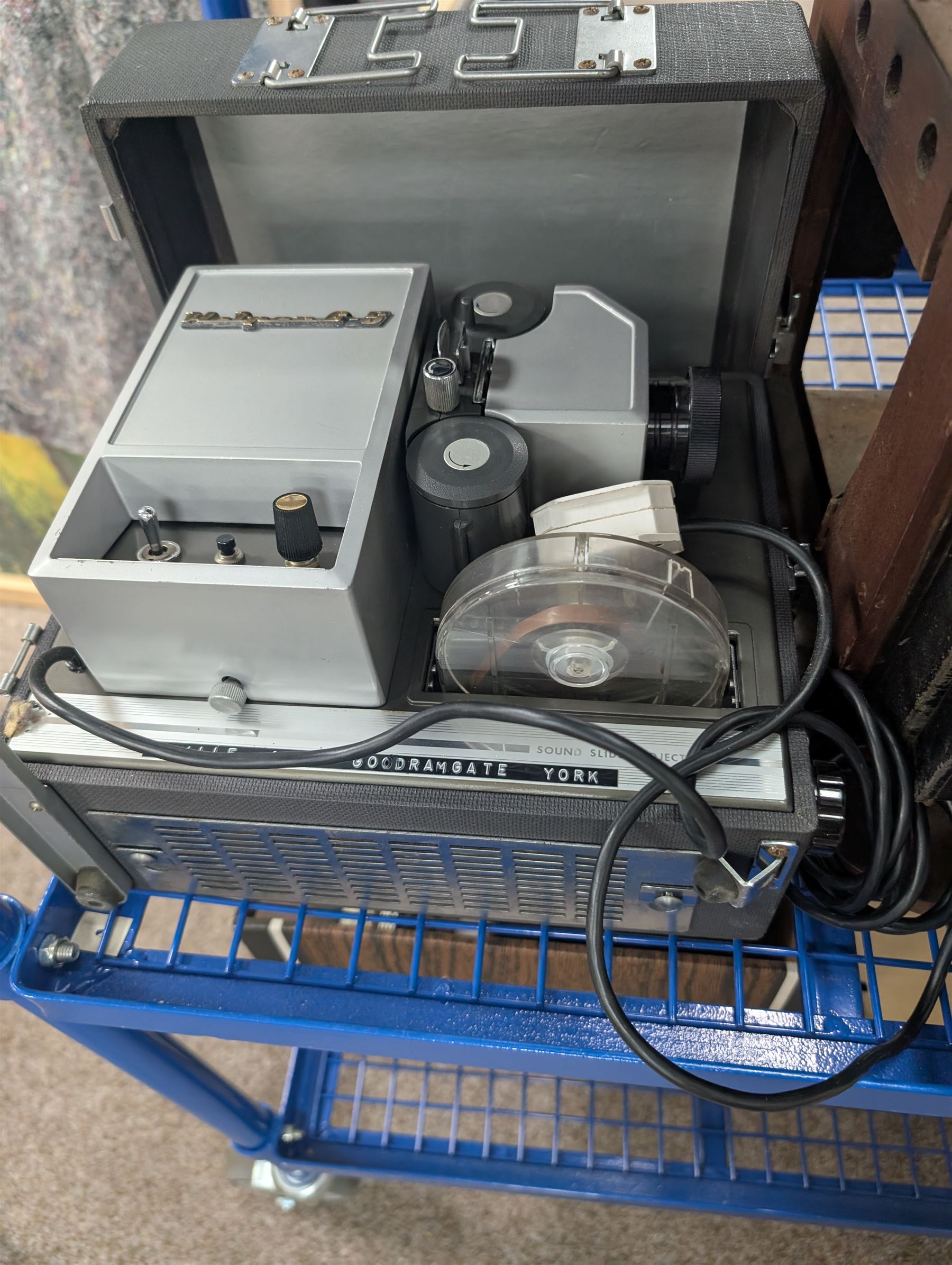 Collection of projectors, epidiascopes, magic lantern and similar, including Bell & Howell 621 projector, mahogany and brass magic lantern, Helper 6S projector, Leitz epidiascope, Zeiss epidiascope, Johnson Optiscope, etc