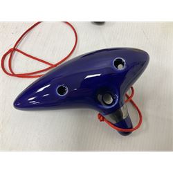 Four ocarinas three 10 hole ocarinas and one 16 hole double ocarina, three of which being from the Legend of Zelda franchise 