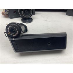 Olympus OM-2 camera body, serial no 1117526, with Olympus OM-System Zuiko Auto-W 28mm 1:2.8'  lens serial no 336591, Olympus OM10 camera body serial no 2392257, with Olympus OM-System Zuiko Auto-Macro 50mm 1:3.5' lens serial no 225784, Soligor C/D mirror lens 1:8 f=500mm' serial no 784035650 together with other camera equipment 