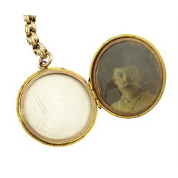 Early 20th century 10ct gold fancy link chain bracelet, with 9ct rose gold locket charm, with engraved bird decoration, Birmingham 1910