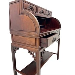 Hardwood cylinder desk, three drawers raised over curved lid, fitted interior with slide, the supports joined by undertier with fret work brackets 