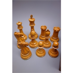  Victorian Jaques and Son London Staunton pattern weighted boxwood and ebony chess set, King H11.5cm, in baize lined mahogany box with central divider and green paper label under lid, both kings stamped JAQUES LONDON, one of each colour rooks and knights also stamped with crown  