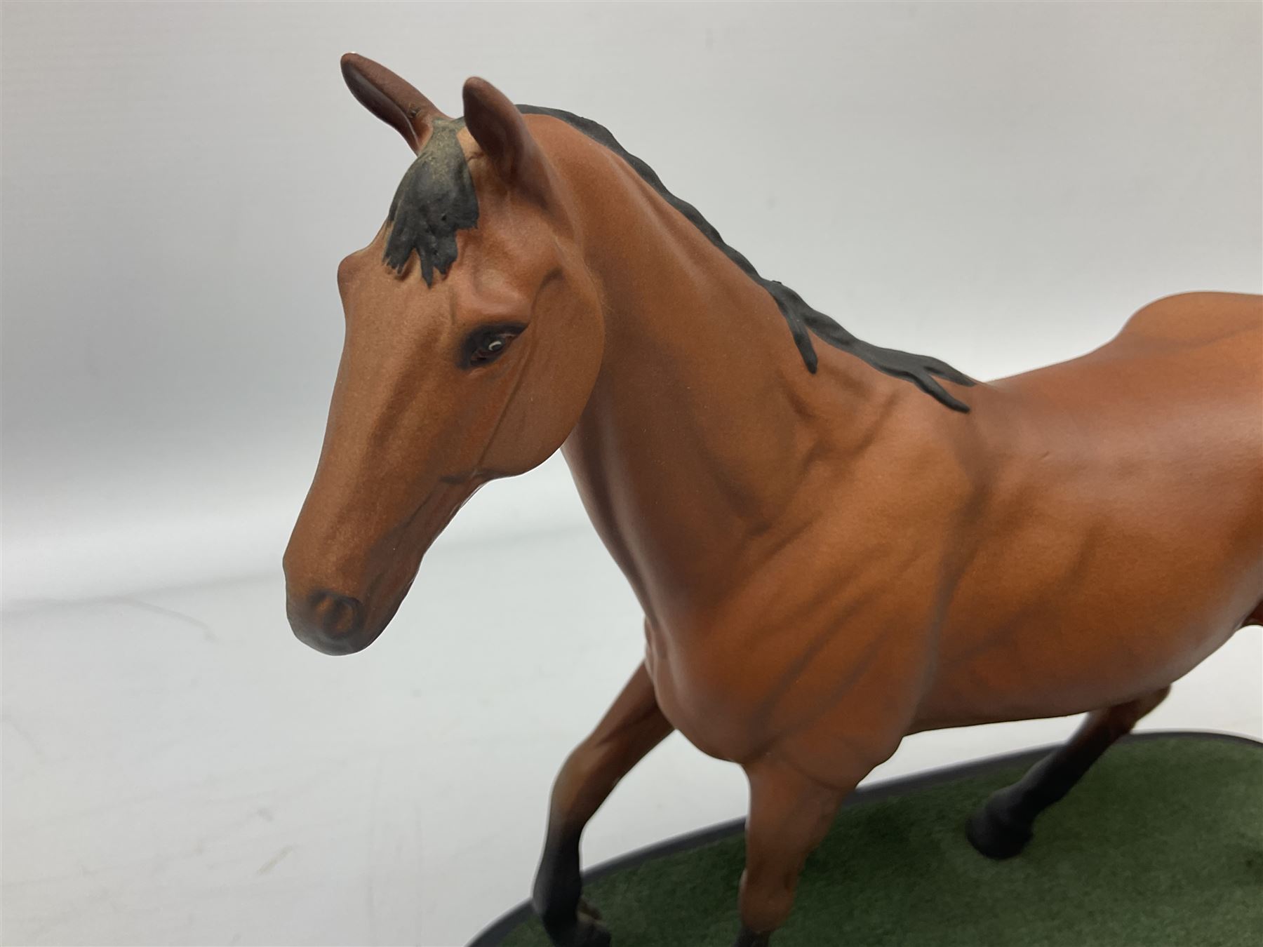 Beswick 'Mill Reef' horse figure, on a wooden plinth together with Beswick Ware horse figure 'Red Rum' on wood plinth, both with printed mark beneath