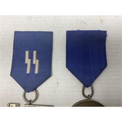 Two post-WW2 copies of German 'SS' Long Service Awards - bronze 8-year medal and silvered 12-year medal; both with ribbons (2)