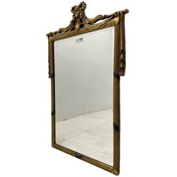 Regency design gilt framed wall mirror, ribbon pediment over hanging linen swags, bevelled mirror plate enclosed by reed moulded frame 