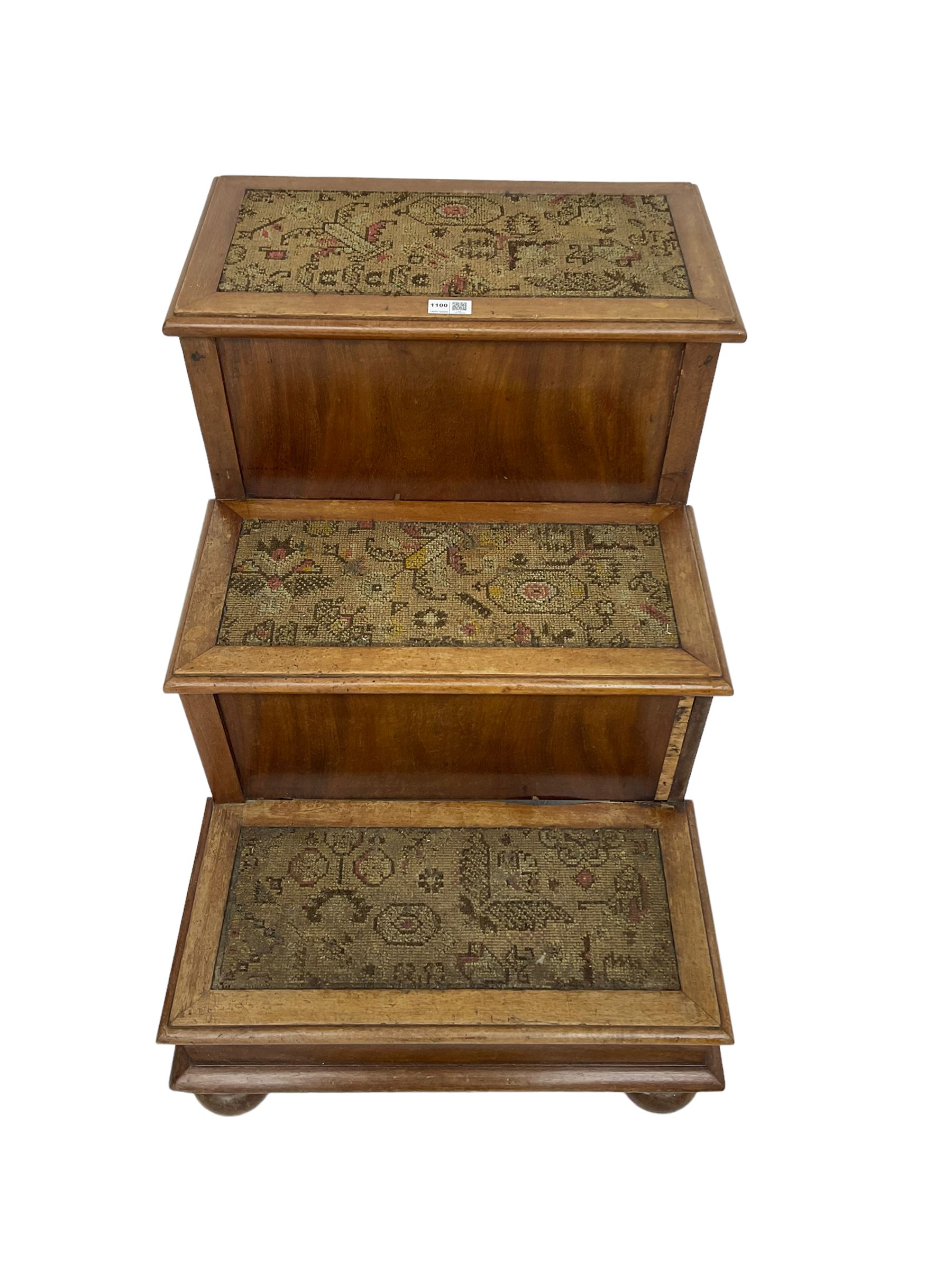 19th century mahogany step commode, pull-out action to reveal commode, the top with hinged lid, on turned feet